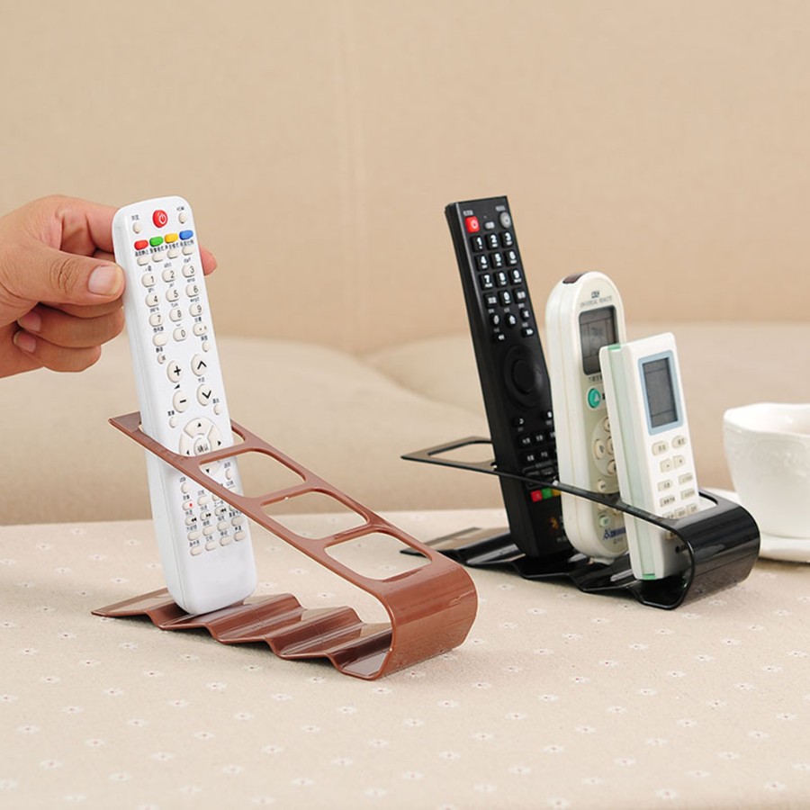 18x7cm-TV-DVD-VCR-Organiser-4-Frame-Remote-Control-Storage-Practical-Mobile-Phone-Holder-Stand-Plastic.jpg